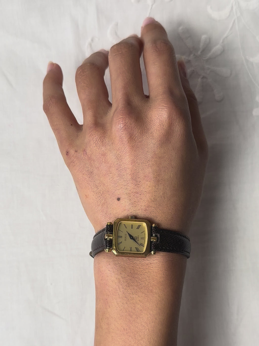 1980s Gucci striped case brown leather quartz watch