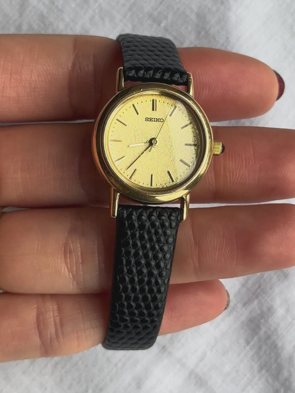 1980s Seiko round black leather quartz watch