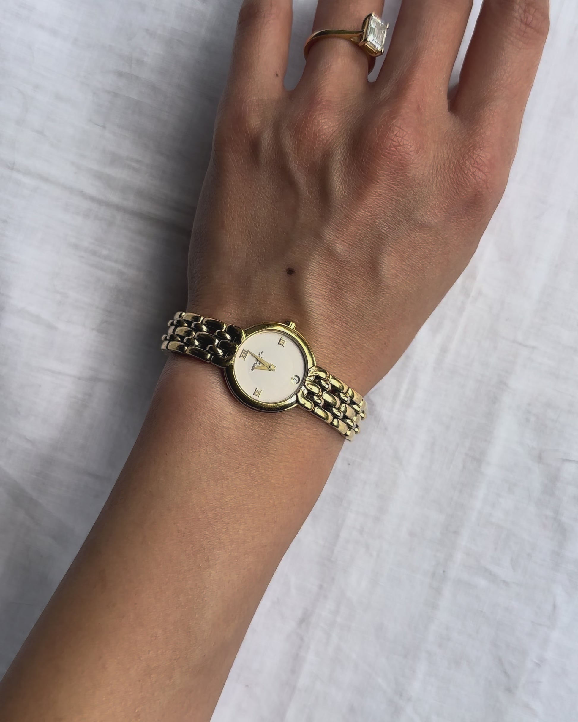 1980s Raymond Weil gold-plated round quartz watch