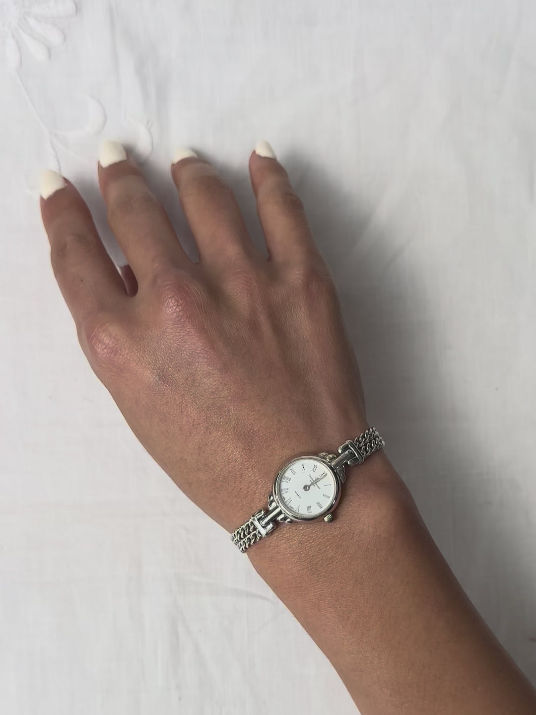 1980s Christian Bernard silver tone chain bracelet quartz watch