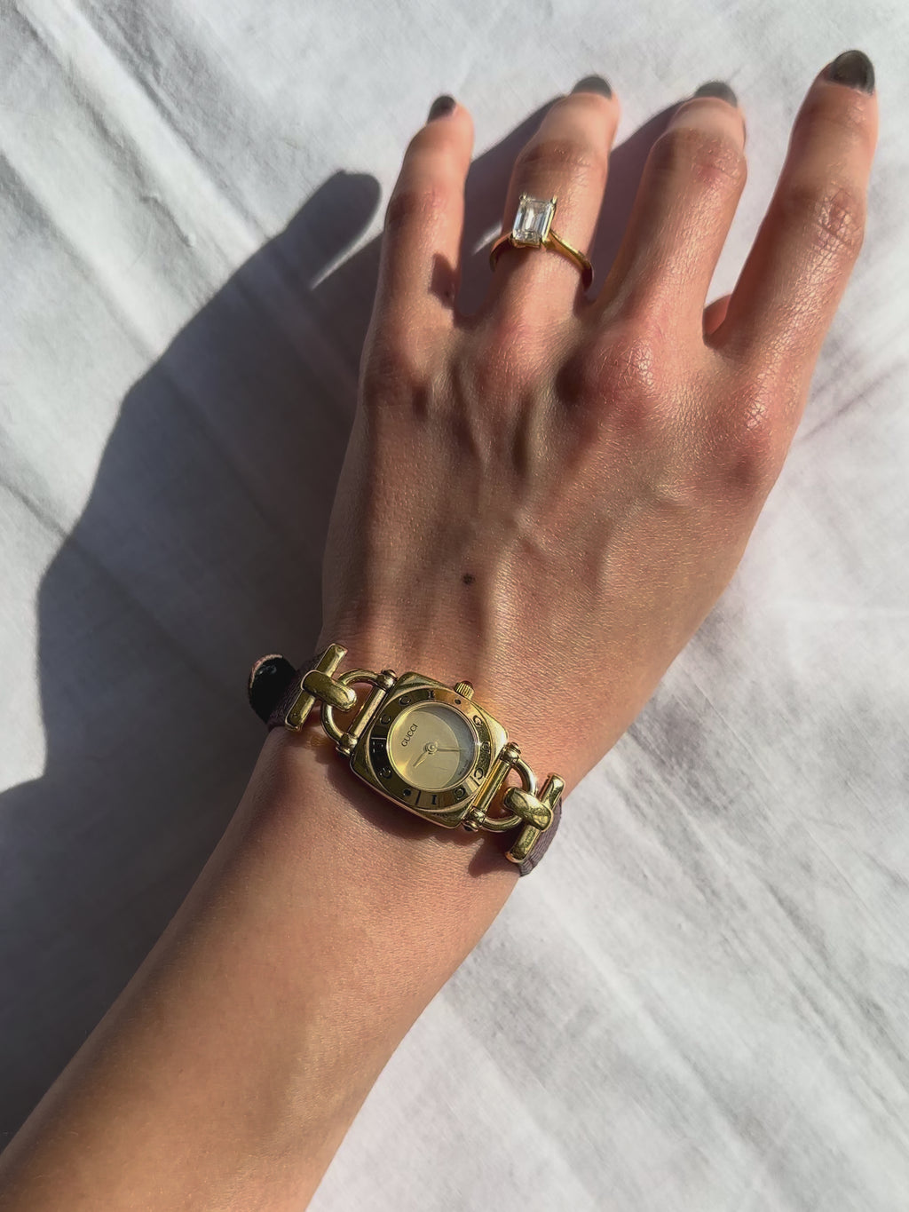 1990s Gucci gold and brown leather quartz watch