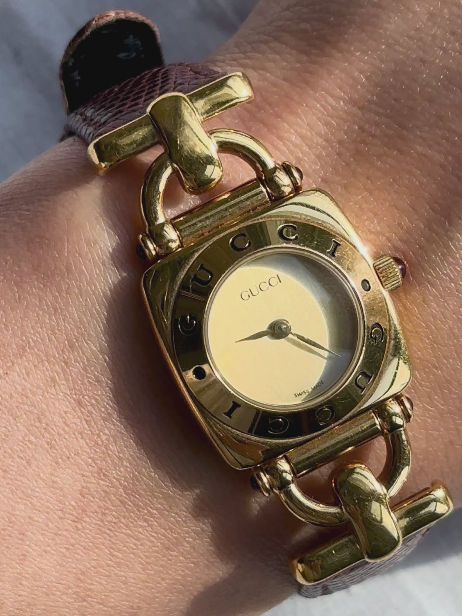 1990s Gucci gold and brown leather quartz watch