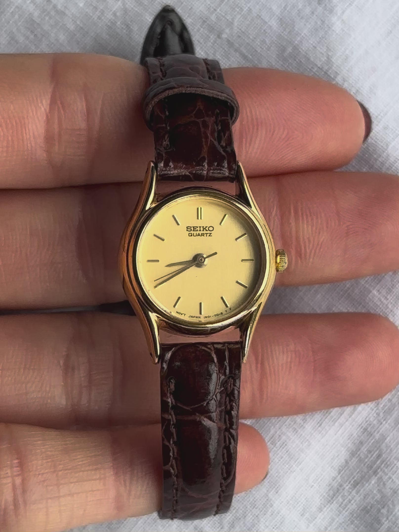 1980s Seiko round brown leather quartz watch