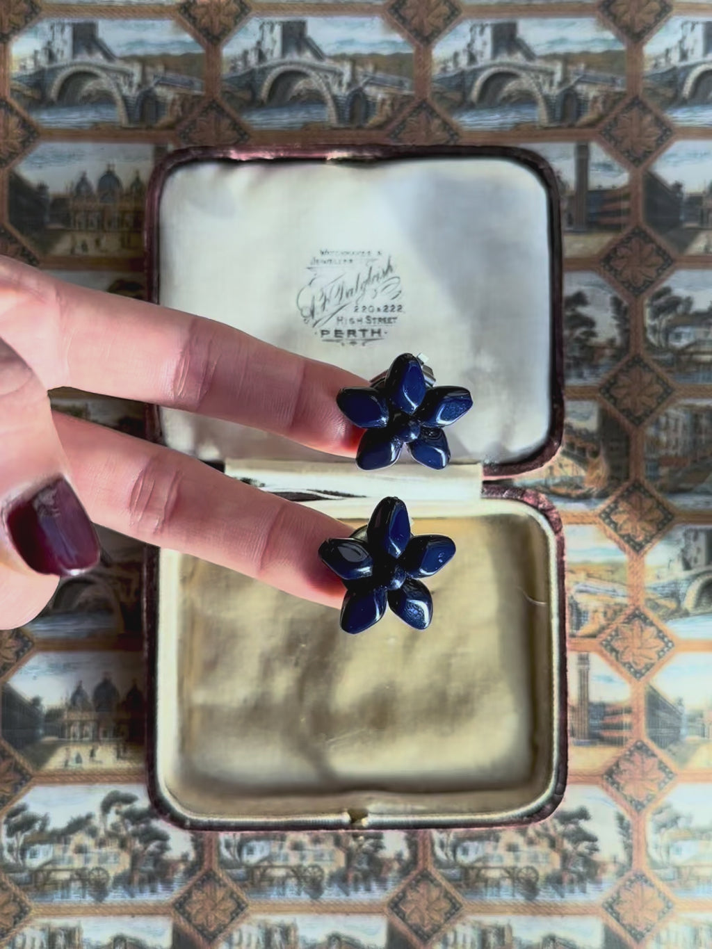 Bellflower blue plastic clip-on earrings